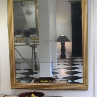Split plate reeded mirror