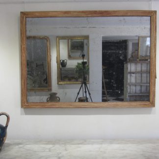 Neoclassical reeded mirror