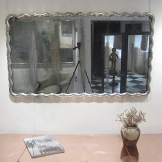 Sublime serpentine mirror